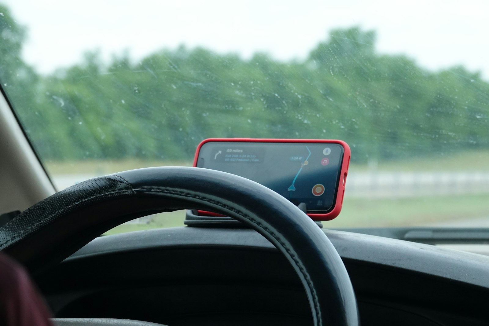 Phone navigation screen mounted inside a vehicle